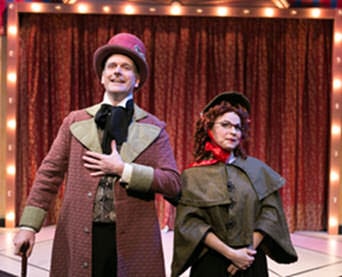 Peter Boyer (Scrooge)-Tracey Stephens (Charity Collector)