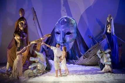Avery Glymph (Ferdinand), Rachel Mewbron (Miranda), and the ensemble of ‘The Tempest.’ Photo by Scott Suchman.