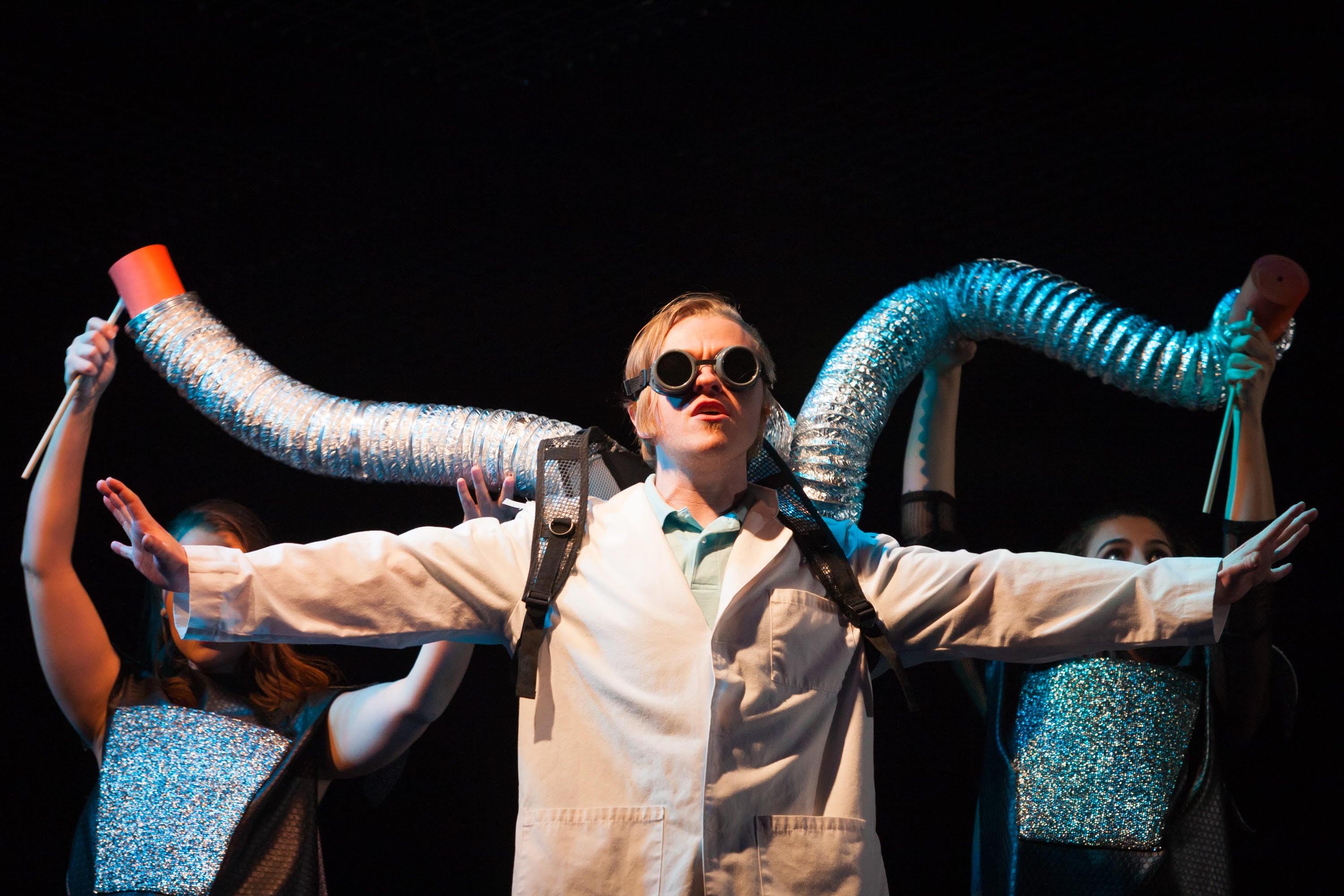 Seth Rosenke (foreground), Ashey Zielinski & Gianna Rapp (background puppeteers) in It's the Rest of the World That Looks So Small. Photo Credit: Ryan Maxwell Photography