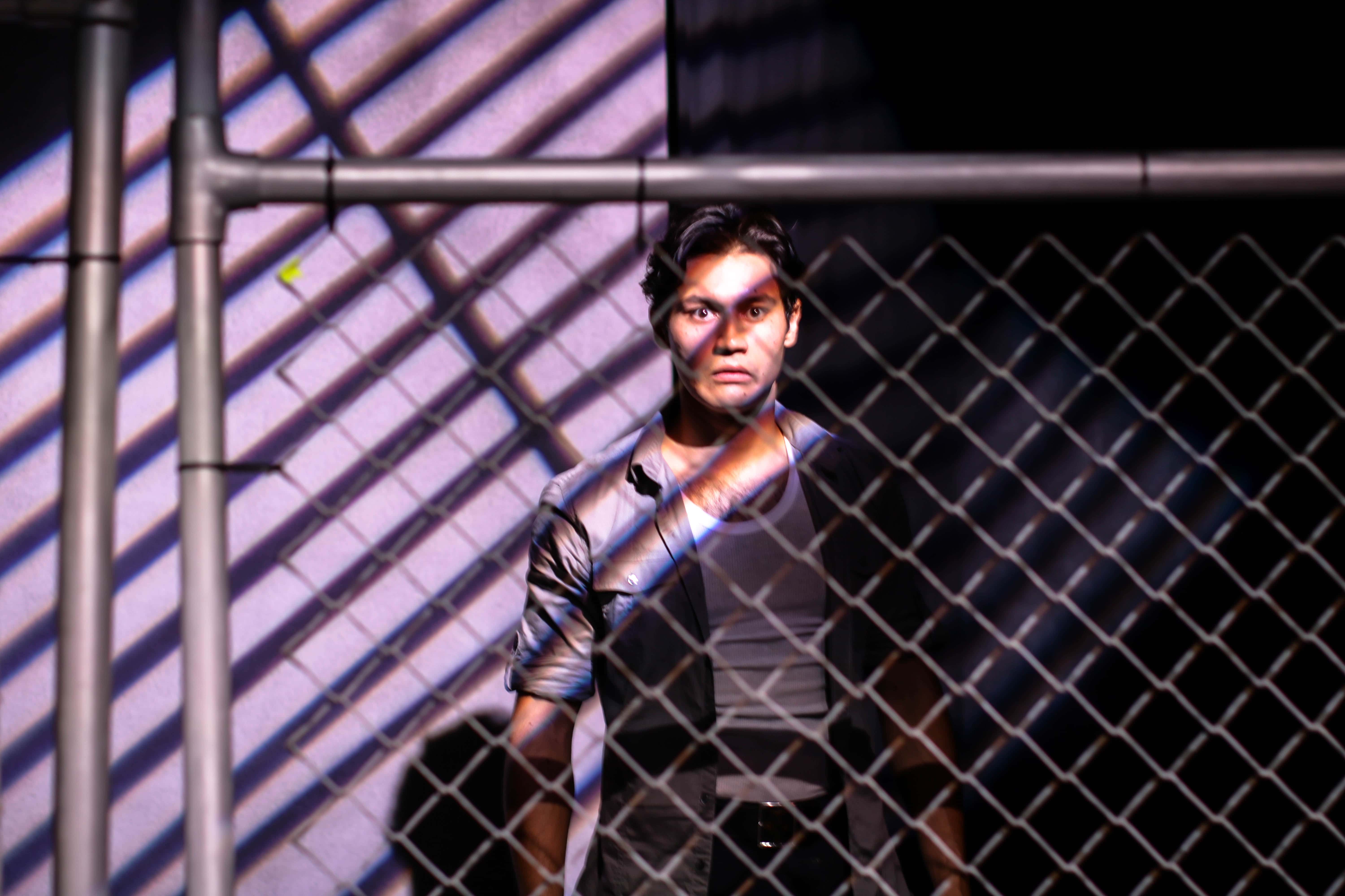 Cristian Linares in  Convergence Theatre's Guerrilla Theater Works 3: A New Nation, now playing at the Anacostia Arts Center. Photo by Ethan Malamud.