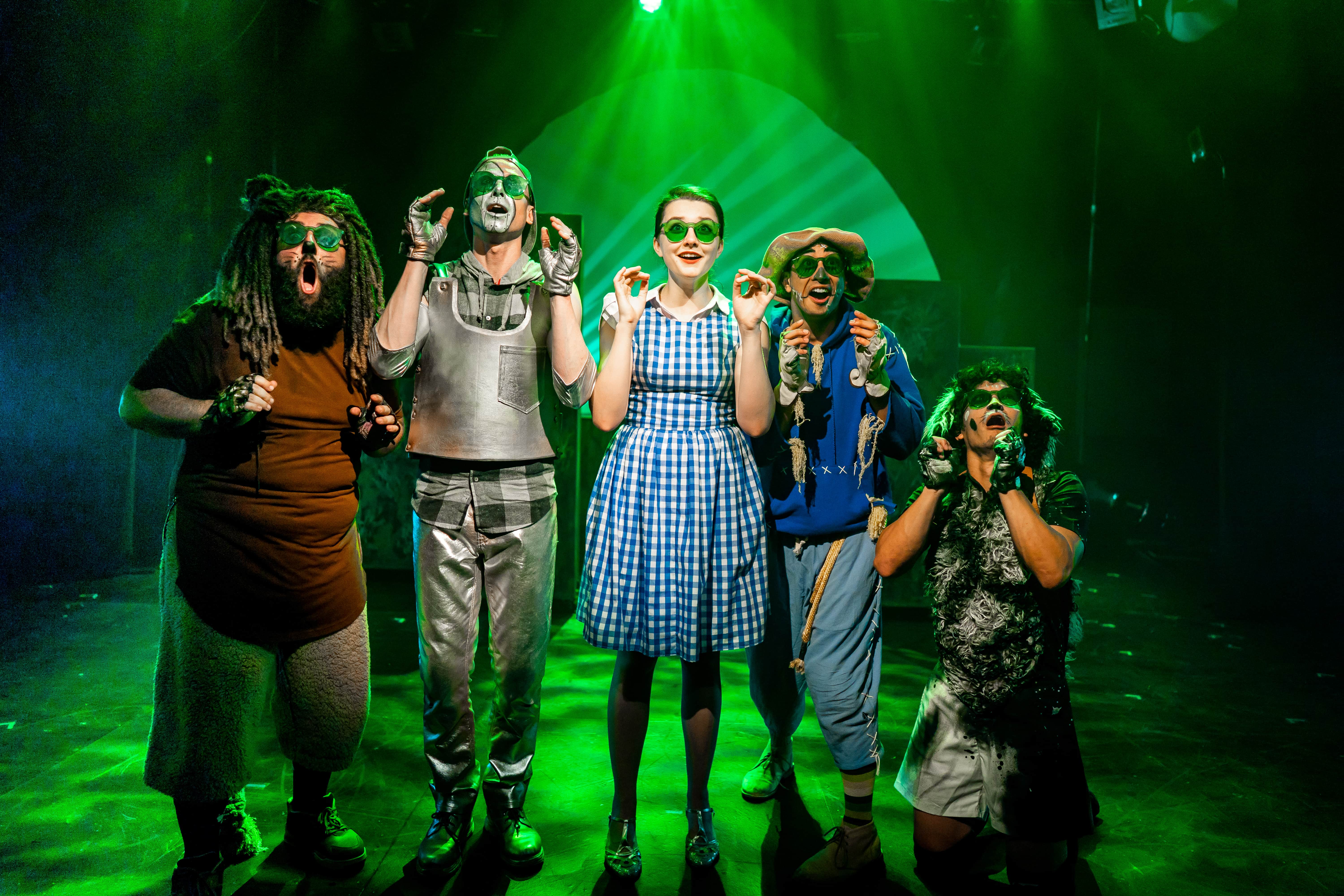 L-R: Lee Liebeskind (Cowardly Lion), Philip Fletcher (Tin Man), Emily Whitworth (Dorothy), Dallas Tolentino (Scarecrow), and Jacob Yeh (Toto) in Synetic Theater's production of The Wonderful Wizard of Oz. Photo by Brittany Diliberto.