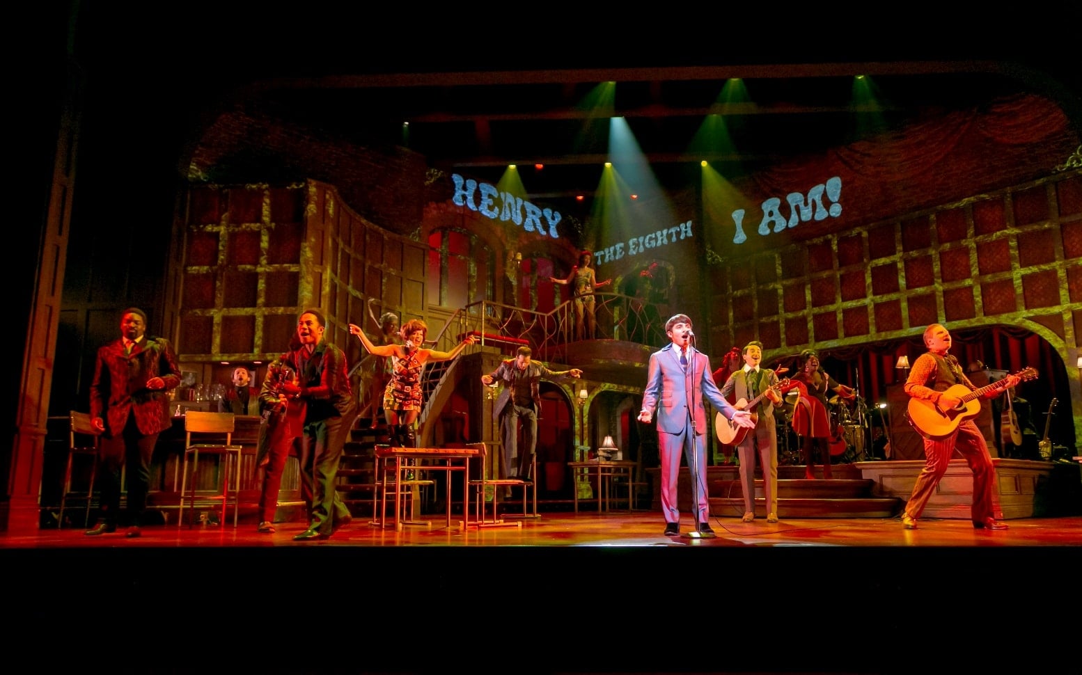 Jonny Amies (in the spotlight) and the cast. Photo by Jerry Dalia. 