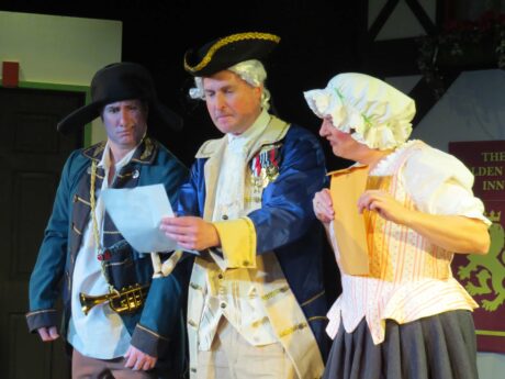 Dorn (Terence Heffernan), Freytag (John Morogiello), and Frau Schmidt (Rebecca A. Herron) find a secret manuscript. Photo by Elizabeth Kemmerer.