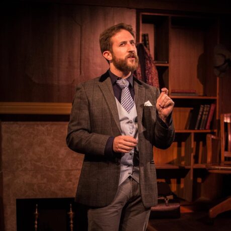 Adam Ressa (Watson) in City of Fairfax Theatre Company's production of 'The (curious case of the) Watson Intelligence.' Photo by Rebecca Kalant-Kelling.