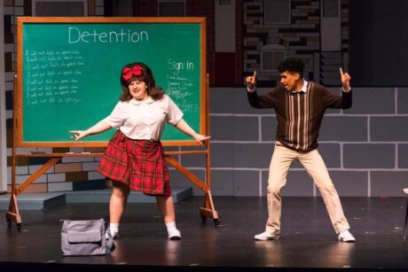 Caitlin Grant as Tracy Turnblad and Christopher Polio as Seaweed J. Stubbs in Rockville Musical Theatre's production of 'Hairspray.' Photo by Stasia Steuart Photography.