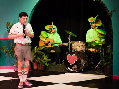 Tony Strowd (Jonathan). In back Steve Przbylski (guitar) and Vaughn Irving drums) as Musical Venus Flytraps. Photo by Johannes Markus.