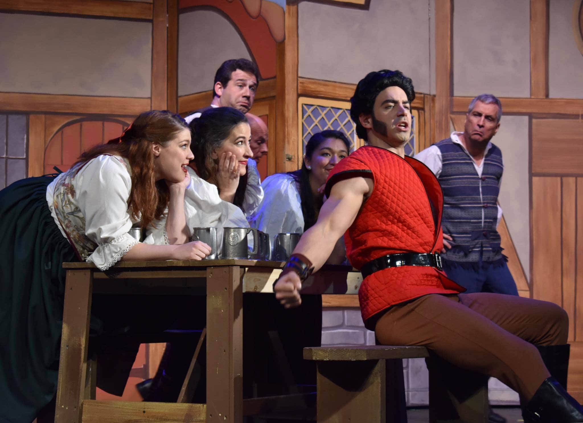 Clay Comer (Gaston) and the cast of Beauty and the Beast, presented by Damascus Theatre Company. Photo by Elli Swink.