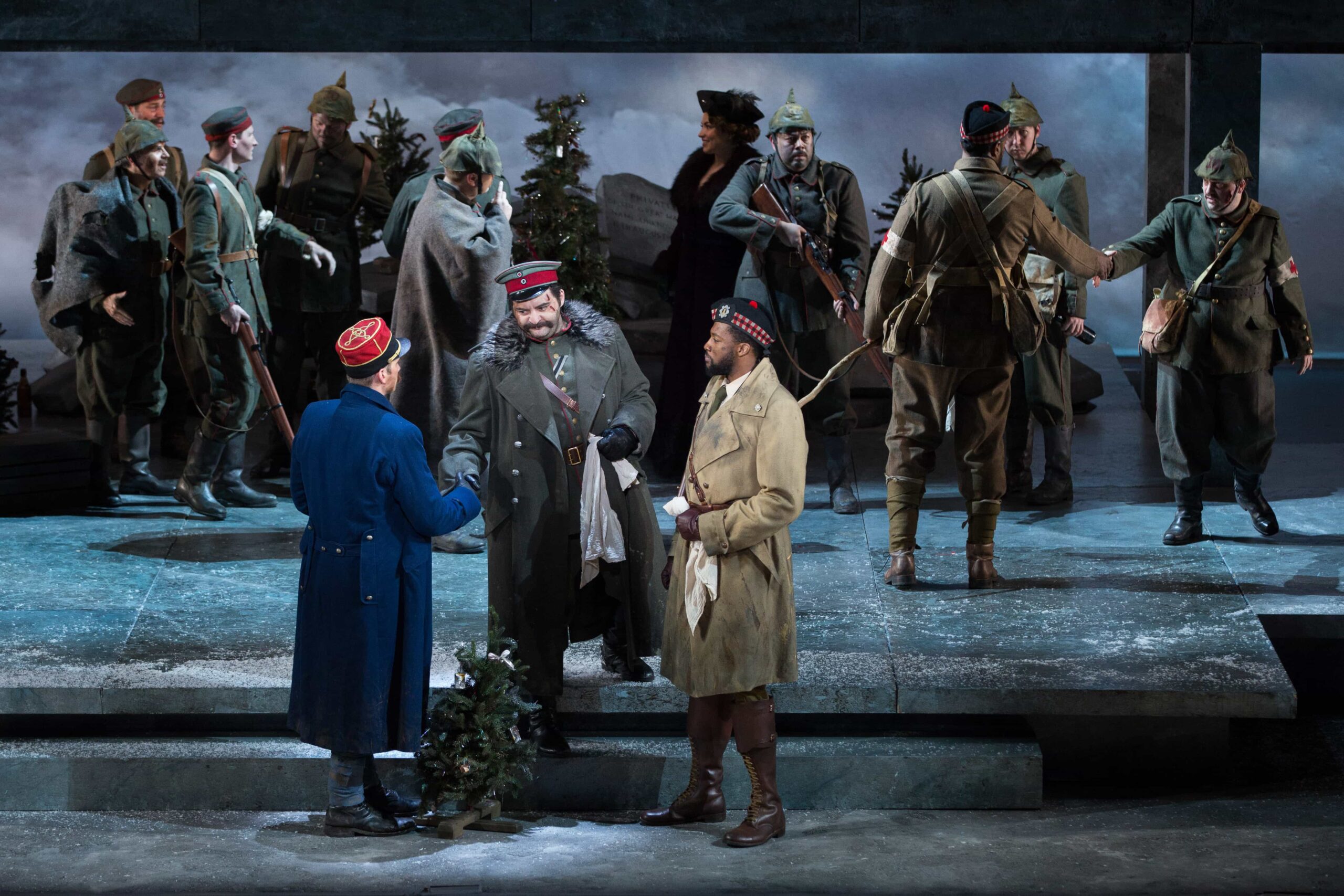 Audebert (Michael Adams), Horstmayer (Aleksey Bogdanov) and Gordon (Norman Garrett) agree to a truce in WNO's Silent Night. Photo by Teresa Wood