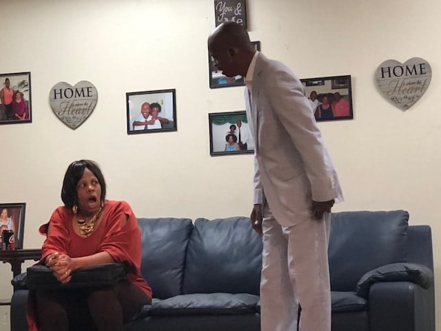 Angela Coles (Evelyn) and Frank White III (Troy) in The Benjamins, performed by the Music and Drama Ministry at Shiloh Baptist Church of Landover. Photo by William Powell.