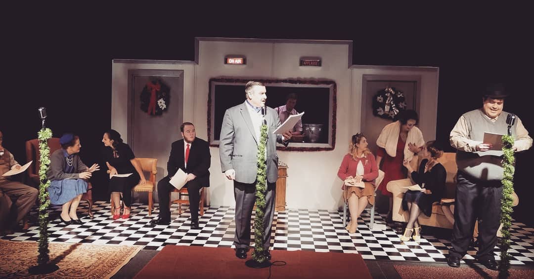 L-R: Don Wilson, Ellen Woodstock, Tashina Harris, Tristan Cooper, Michael Clendenin, Matthew Scarborough, Kelsey Lane, Rebekah Raze, Eileen Marshall, and Andrew Morin in It's A Wonderful Life: A Live Radio Play, presented by Prince William Little Theatre. Photo courtesy of Prince William Little Theatre.