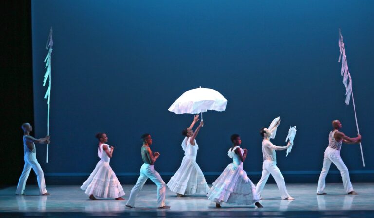 Alvin Ailey American Dance Theater performs Alvin Ailey's Revelations. Photo by Donna Ward.