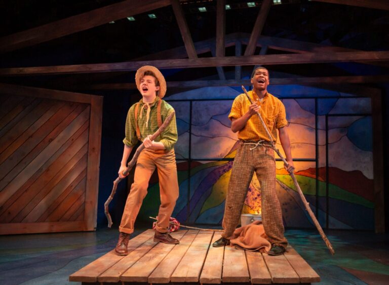 Max Gerecht (Huck) and Nathan Butts (Jim) in the world premiere of Huckleberry Finn's Big River at Adventure Theatre MTC. Photo by Ryan Maxwell.