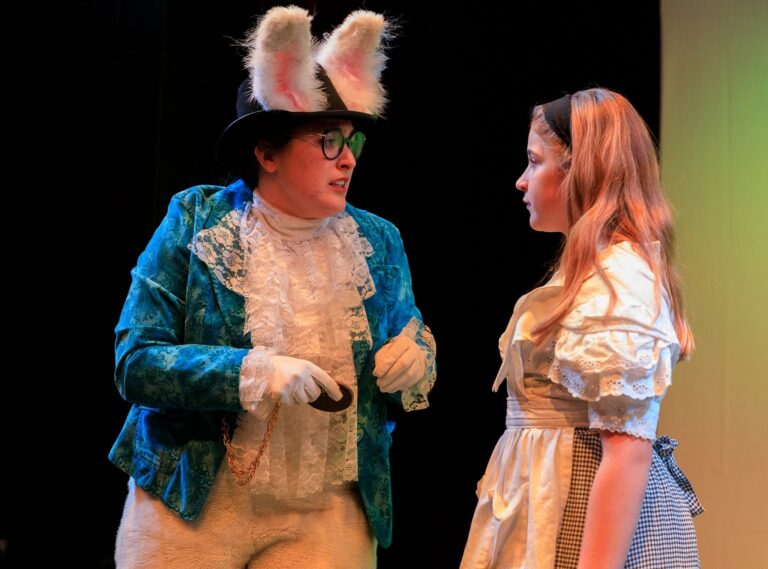 Izzy Smelkinson as the White Rabbit and Madeline Aldana as Alice. Photo by Keith Waters Kx Photography.