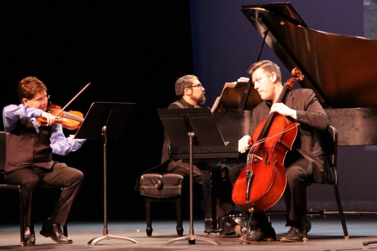 L-R: Leonid Sushansky (violin), Carlos Cesar Rodriguez (piano) and Sean Neidlinger (cello) of the National Chamber Ensemble perform 'The Viennese Classics.' Photo by Angela S. Anderson.