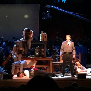 Ian Coursey and the company of YAA's Les Misérables. Photo courtesy of YAA.