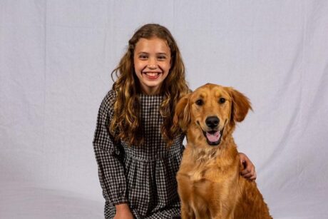 Michelle Stein as Annie and Tucker MacFarlane as Sandy the dog in Prince William Little Theatre's production of 'Annie.' Photo by David Harback.