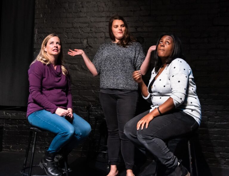 Molly Murchie, Donna Steele, and Krystal Ramseur perform with Washington Improv Theater's Hellcat. Photo by Jeff Salmore.